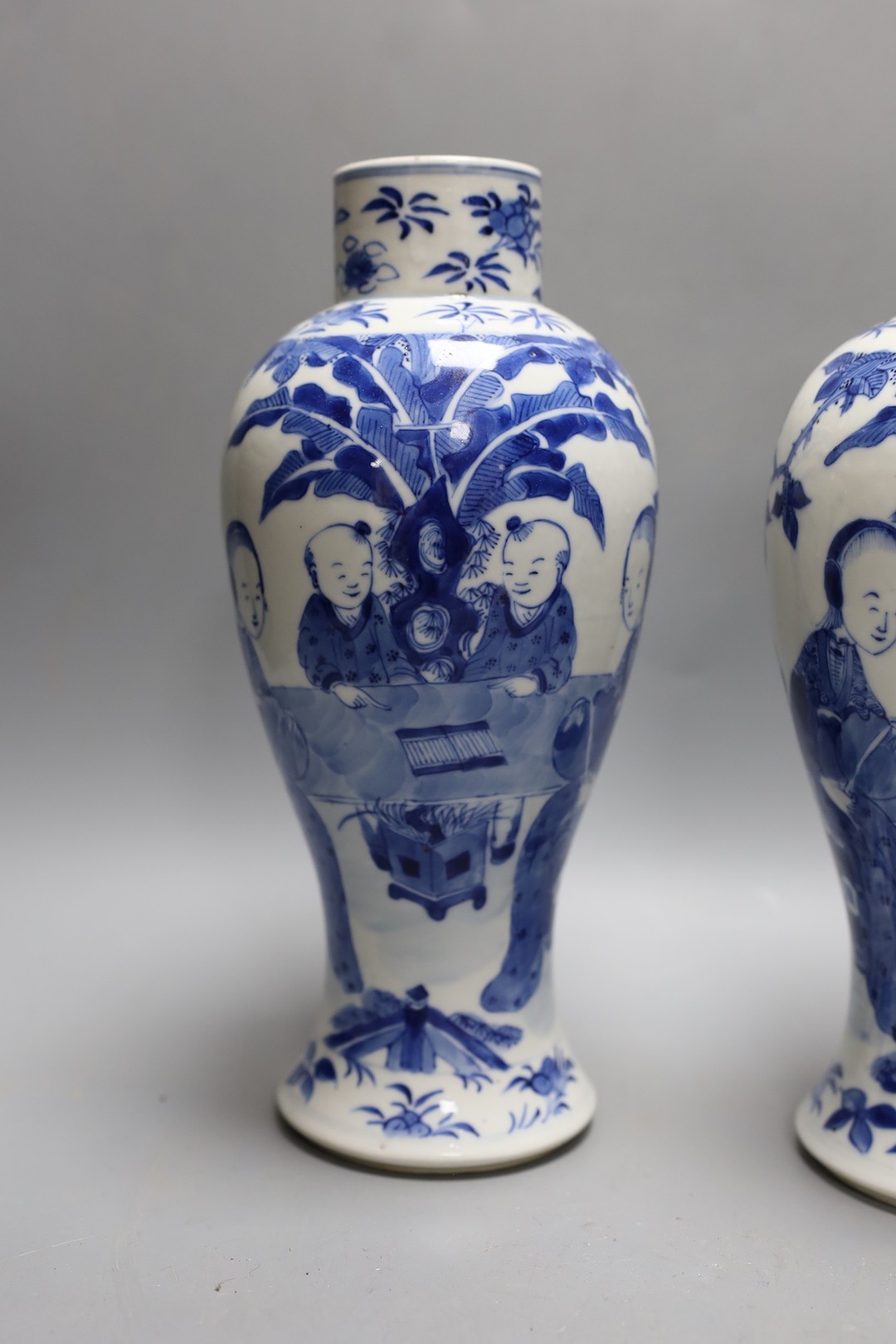 A pair of Chinese blue and white ‘boys’ baluster vases and a Chinese blue and white jar, 19th-century and later 27cm